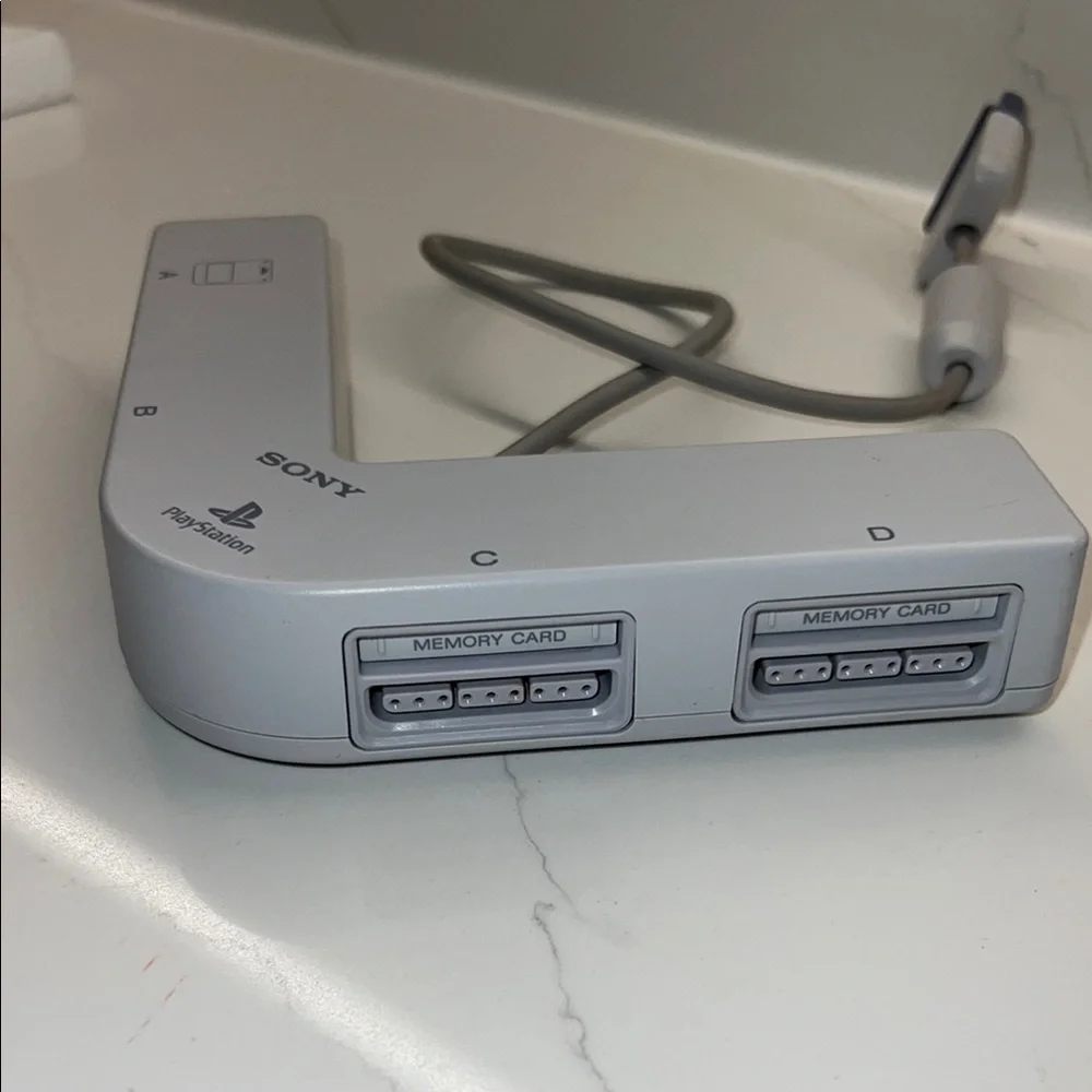 Sony PlayStation Gray Multi-Tap Adapter